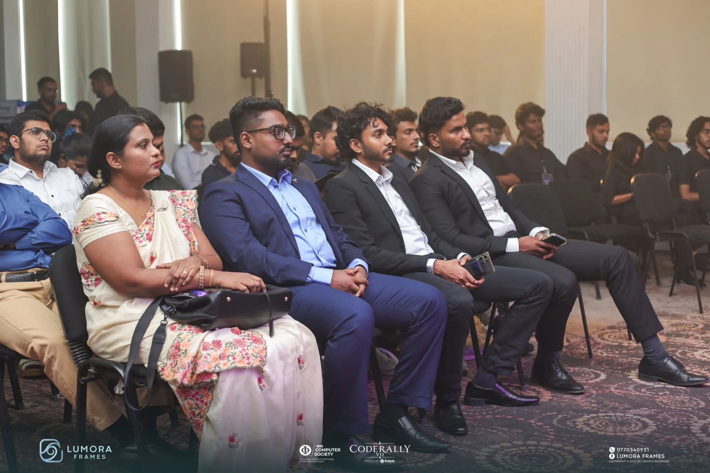 Guests and participants seated at the CodeRally VII opening