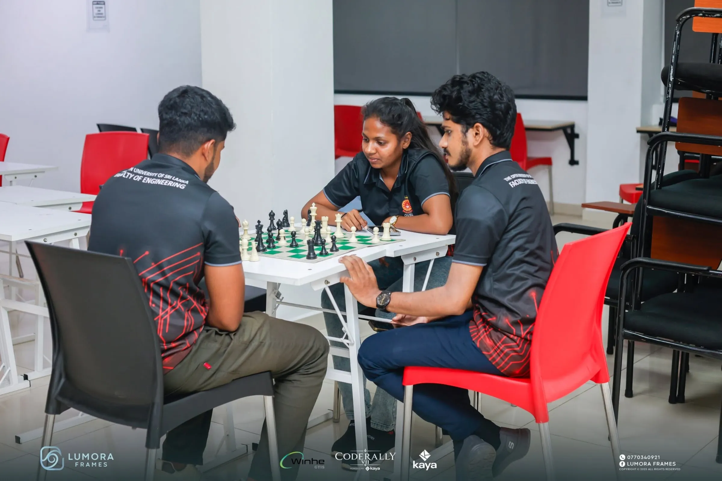 Two participants playing chess during a side event