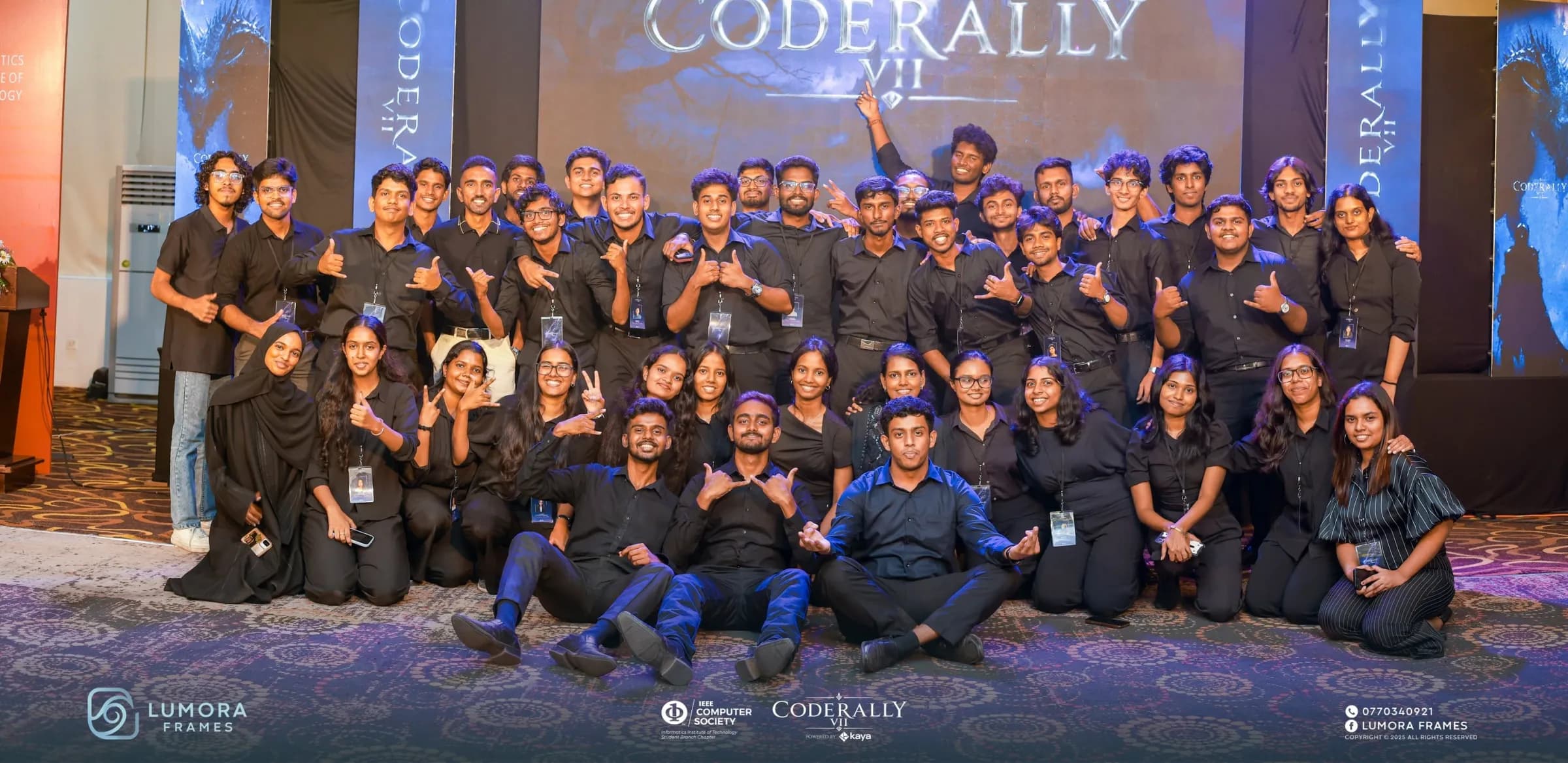 The CodeRally organising team celebrating on stage