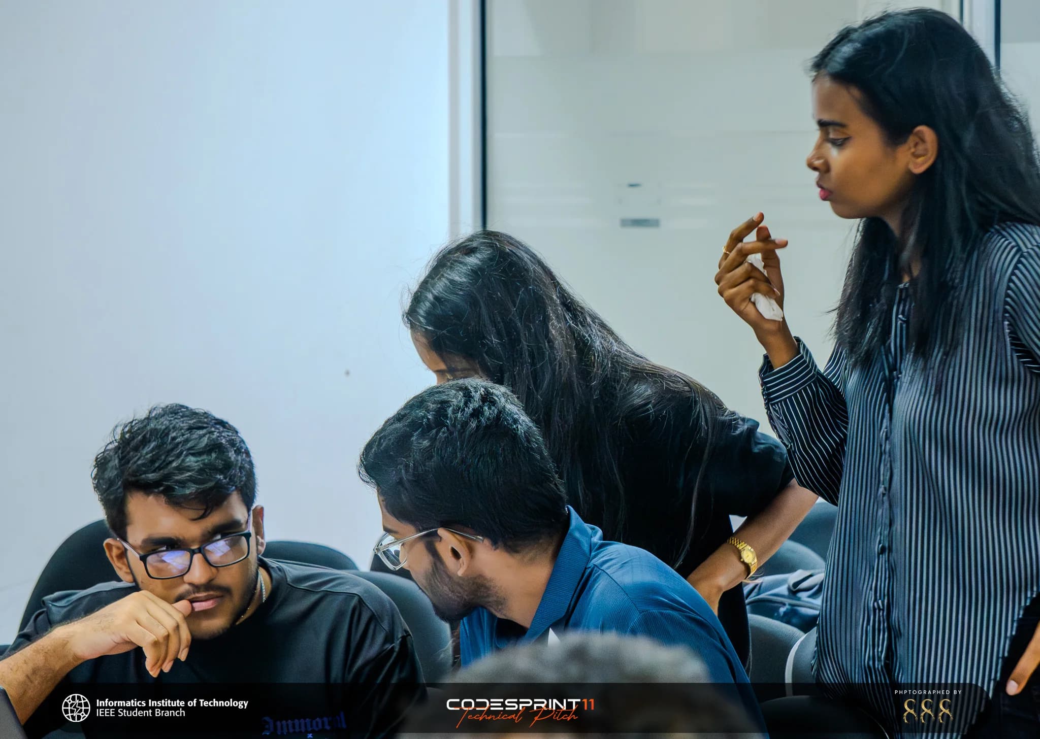 CodeSprint Technical Pitch Day team in discussion