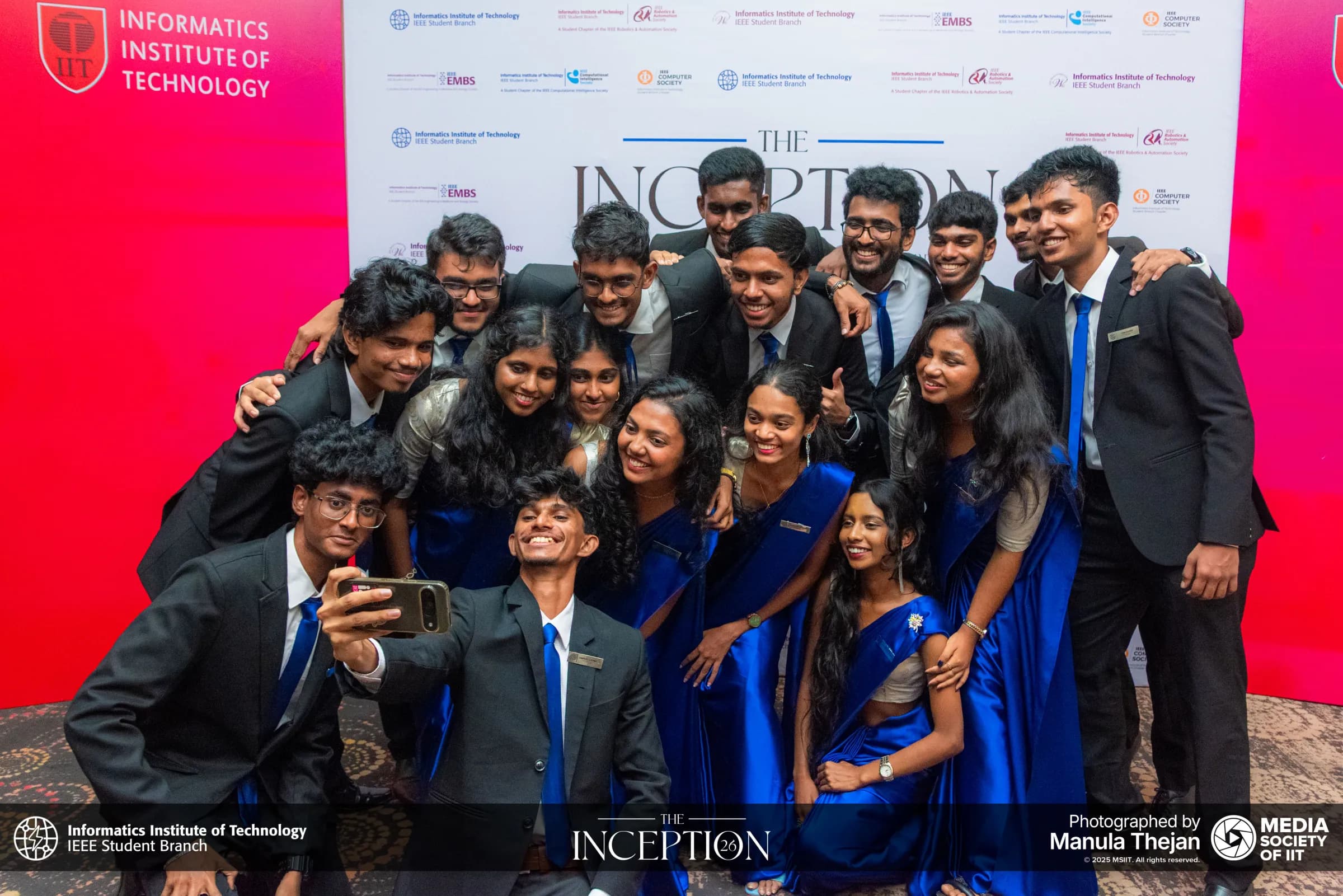 The committee crowding in for a group selfie