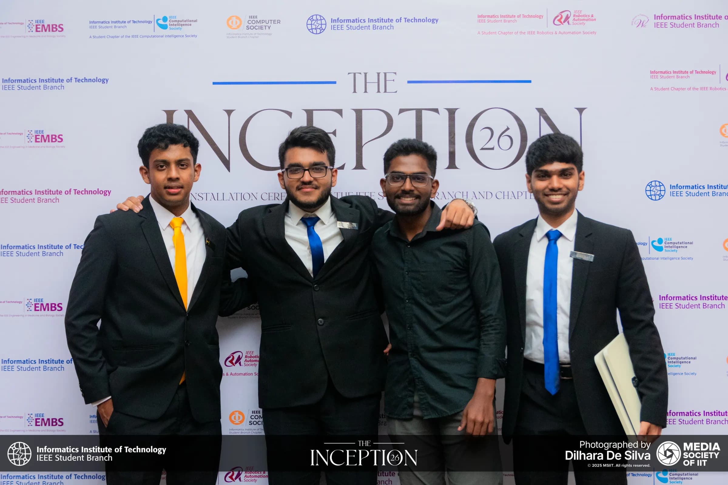 Committee members posing together at the ceremony
