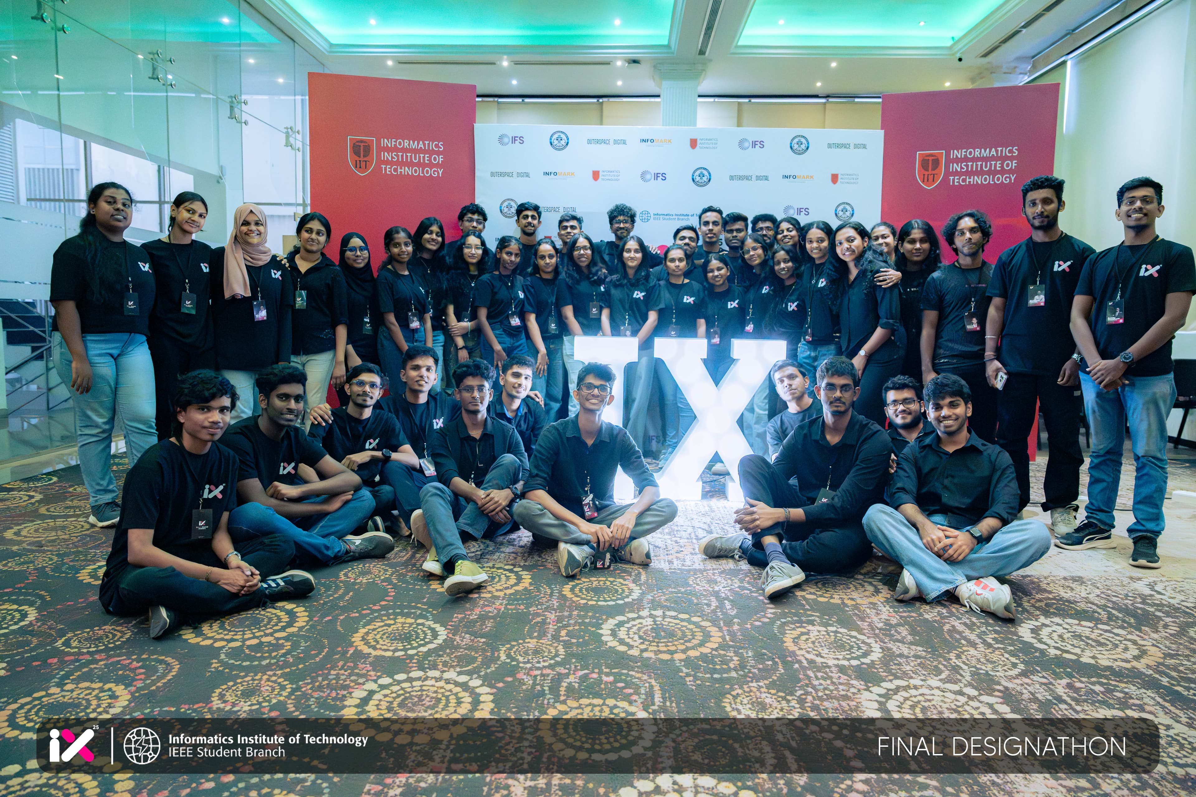 The full IX 25 organizing committee posing together